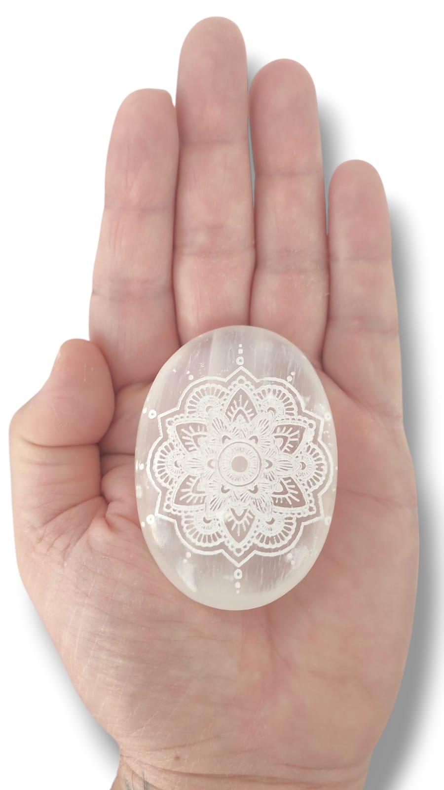 Piedra de selenita en forma de jabón para calmar la ansiedad.