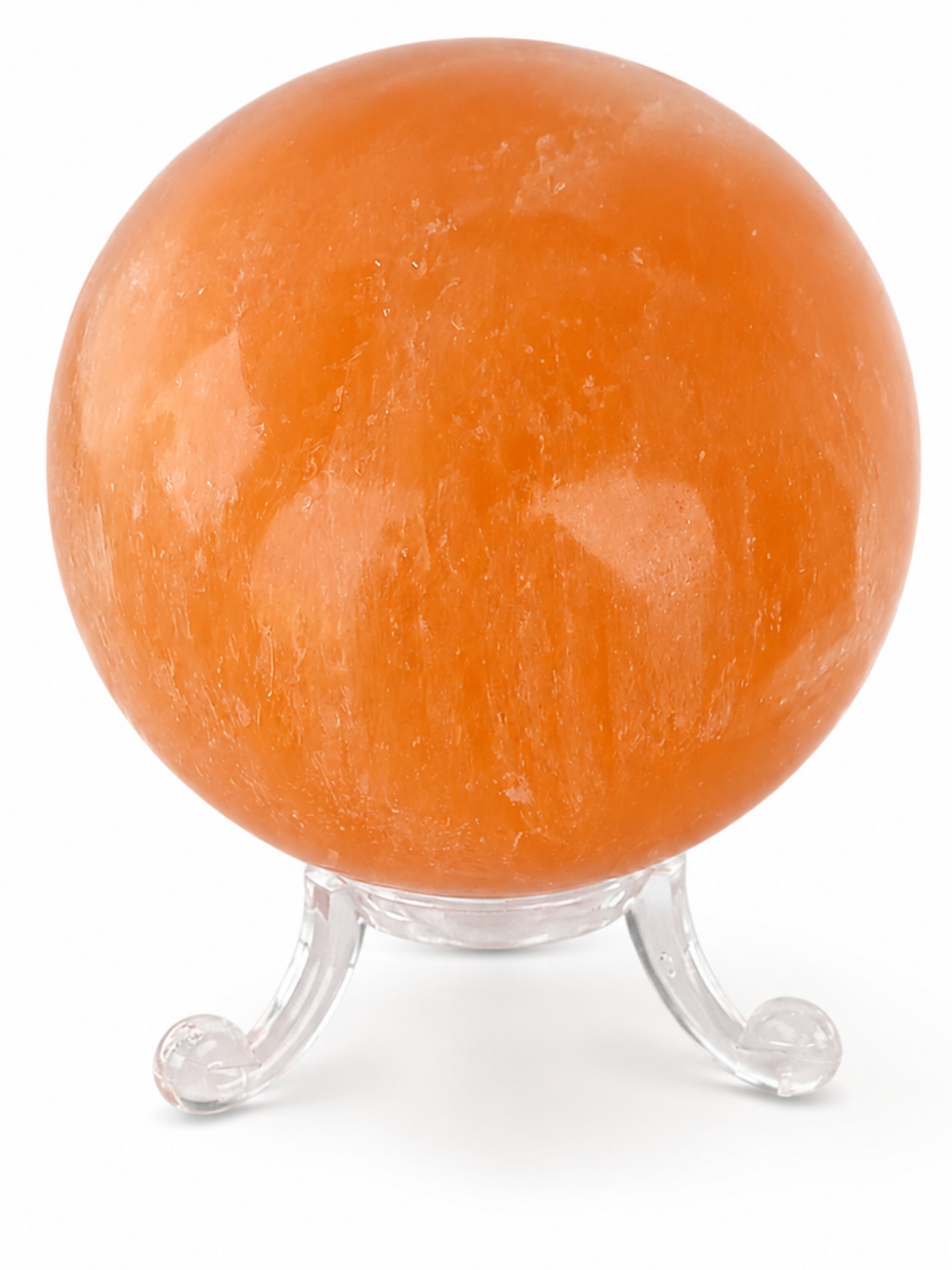 Esfera de selenita naranja grande 8cm sobre expositor de metraquilato