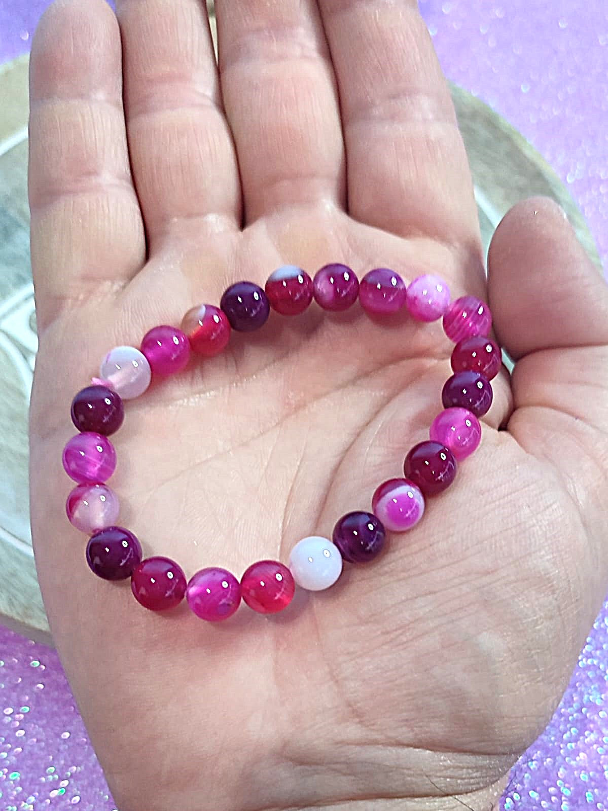 Elegante pulsera de ágata rosa en cuentas de 8 mm, ideal para armonizar el chakra corazón