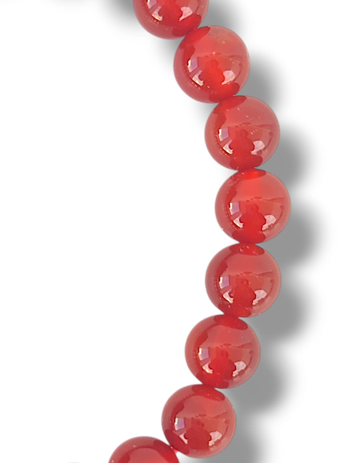 Detalle de pulsera de carneola 8mm piedra natural naranja intenso para energia y vitalidad